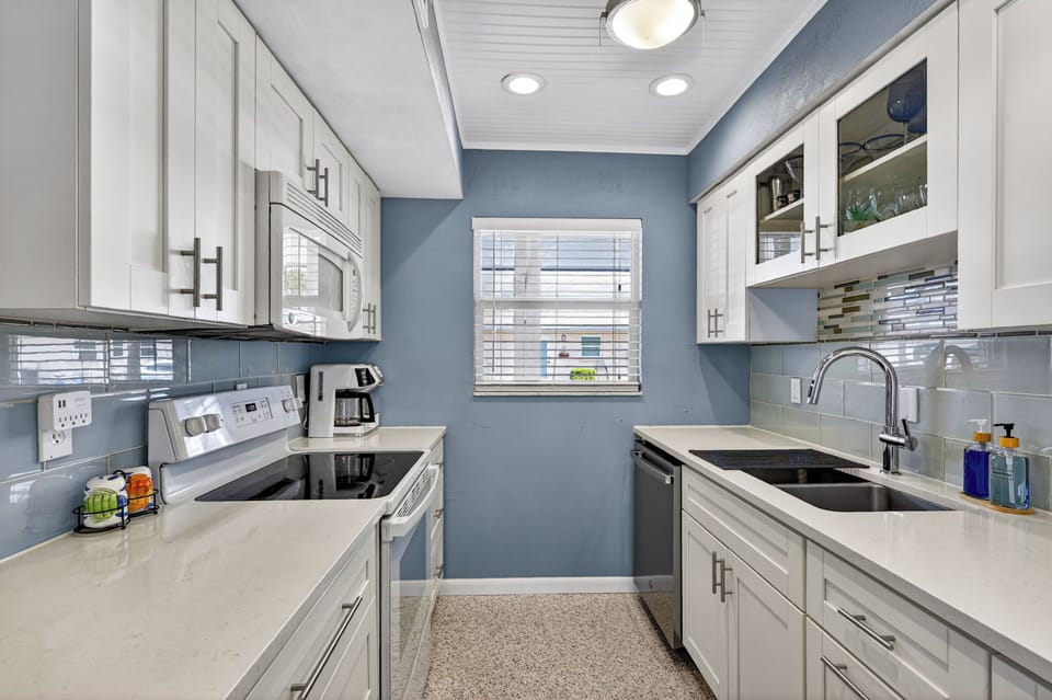 The galley kitchen has all the amenities of home.