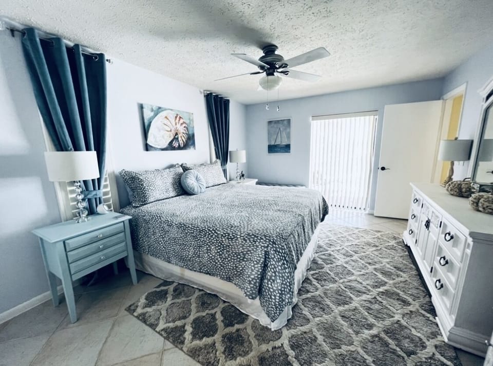 Master bedroom with slider to pool