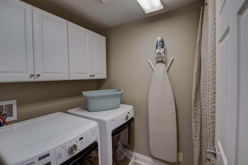 New large-load washer and dryer.  Iron and ironing board.