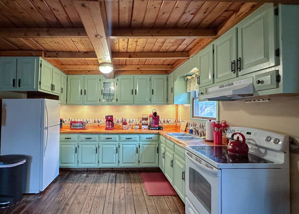 Whip up delicious meals in our charming kitchen.