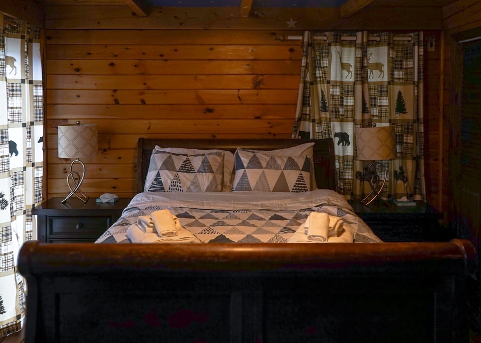 Rest in comfort with rustic elegance in our charming bedroom.