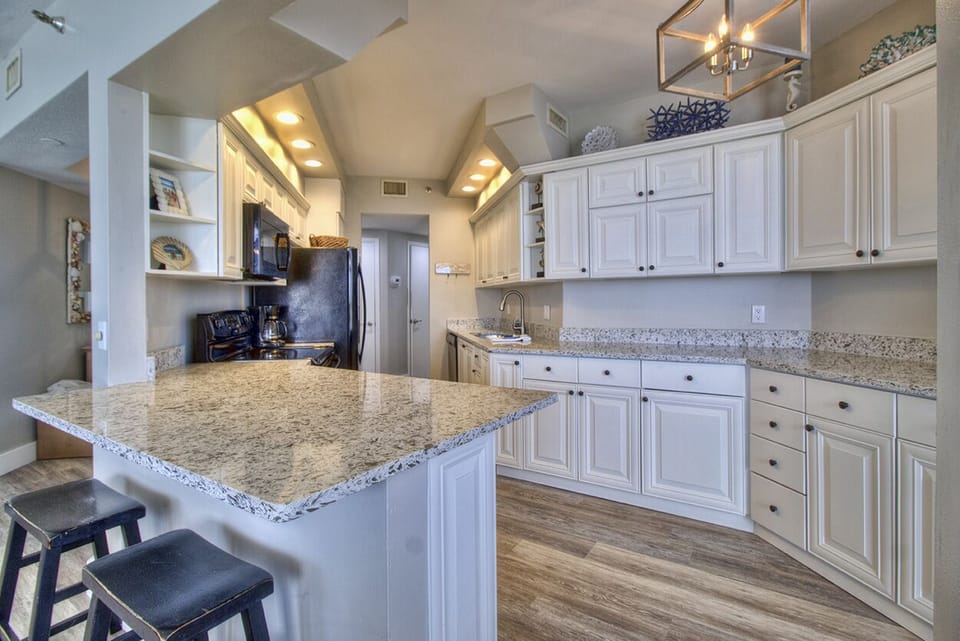 New Quartz Counter Tops, Faucet, Light Fixtures  & Painted White Cabinets