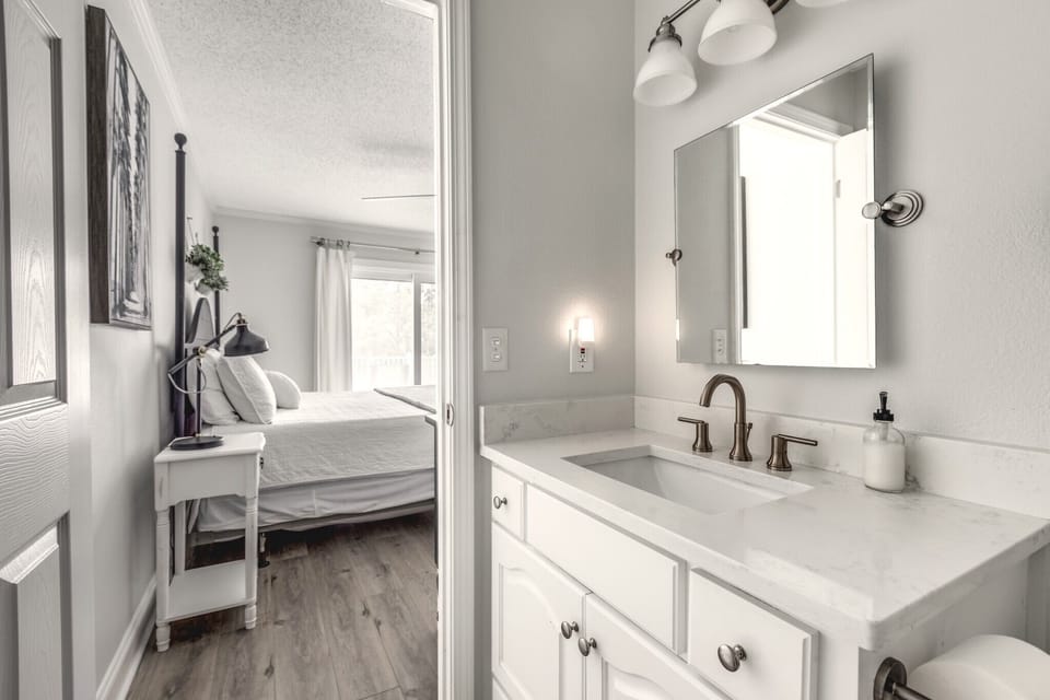 Master bedroom private bathroom with shower/tub combo. 