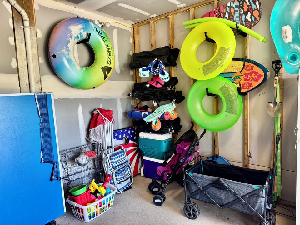 Garage with ping pong table, floats, wagon, beach gear, and more!