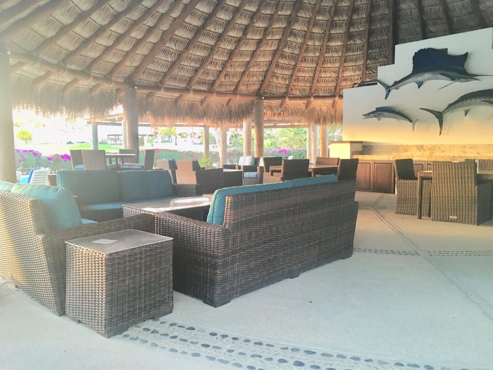 beautiful palapa area- sitting areas, wifi and pool 