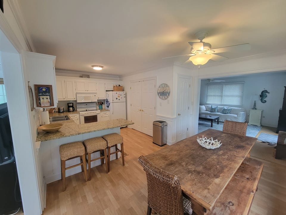 The kitchen connects the living and family rooms.  