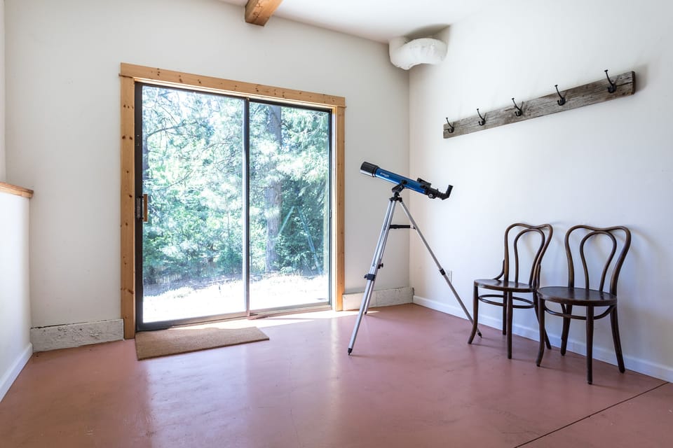 Basement mudroom sliding glass door.