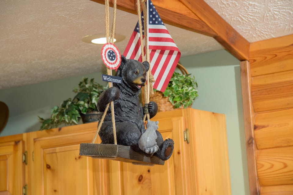 Our friendly bear swings above the bar