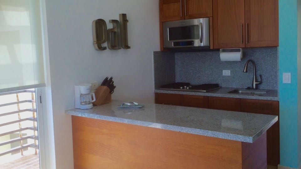 Fully appointed kitchen with high end cutlery, pans and accessories.