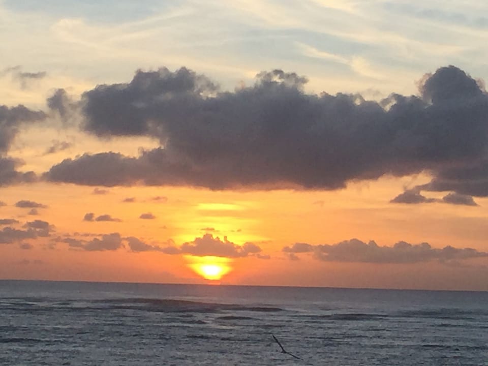 Enjoy coffee and the sunrise from the oceanfront patio. 