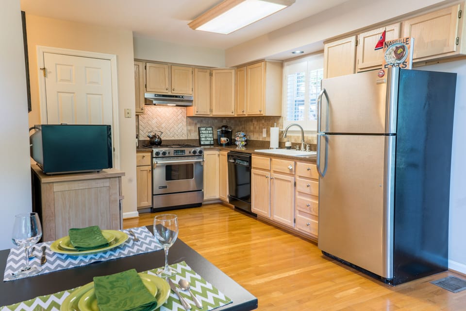 Fully stocked Gourmet kitchen with Jenn Air range and tons of cooking gadgets!