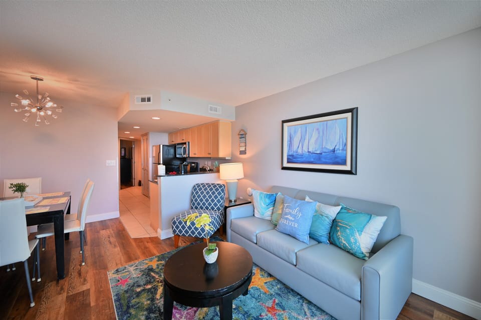 A lively coastal retreat featuring a vibrant living-dining area 