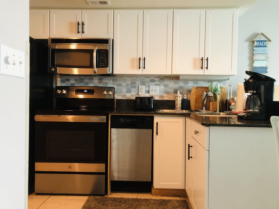 Full kitchen with satainless steel appliances
