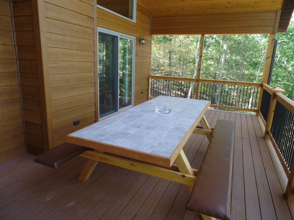 Custom made picnic table with cushioned benches