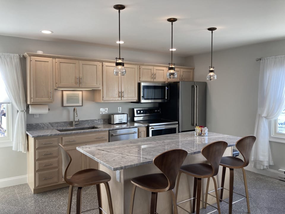 Enjoy cooking in a fully equipped kitchen with Al-clad pans. Dishes for eight.