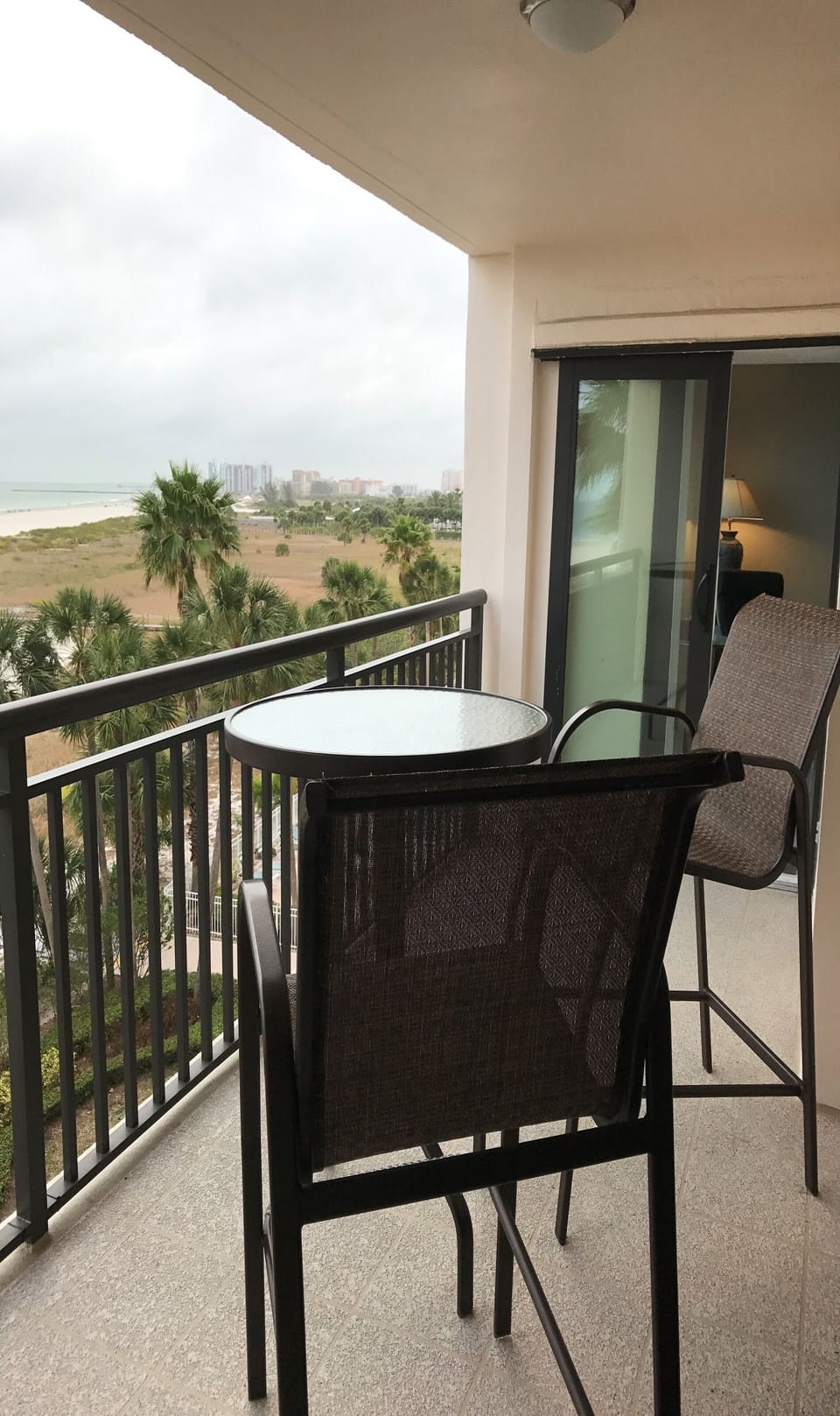 Private balcony with chairs and lounges