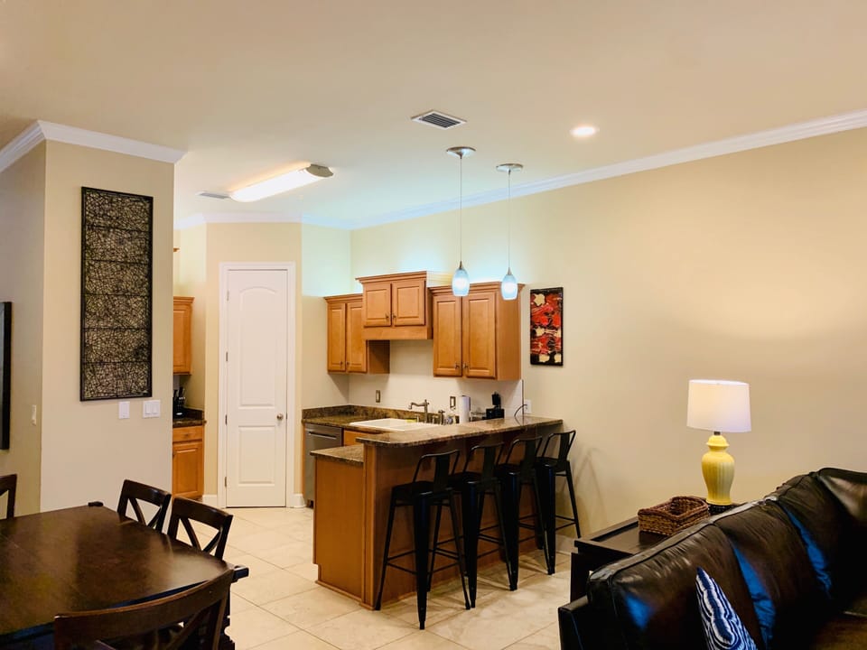 View of Kitchen.  4 counter stools 