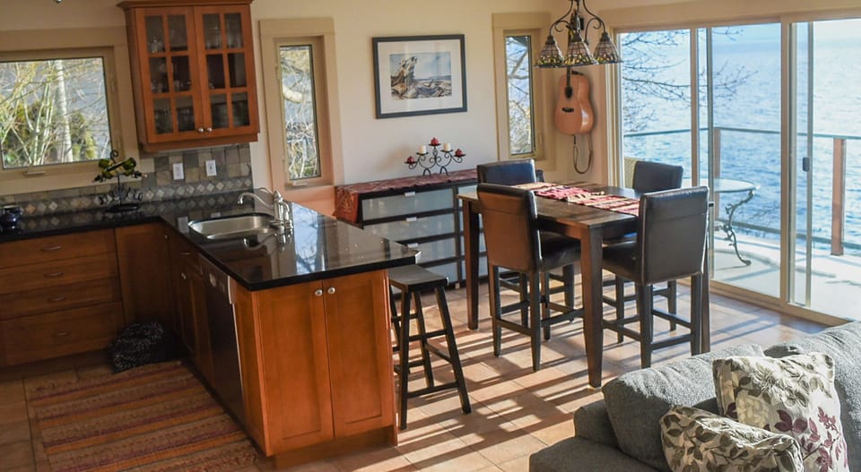 Our open kitchen, dinning, living room is a joy to cook and gather together in.