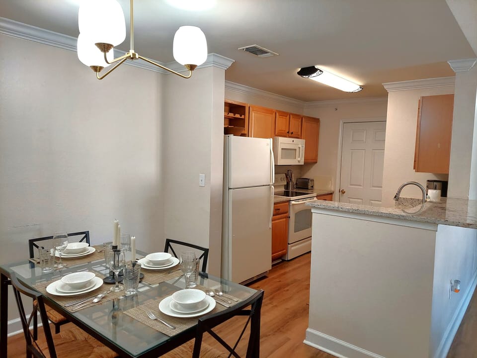 Dining room with direct access from kitchen for easier hosting