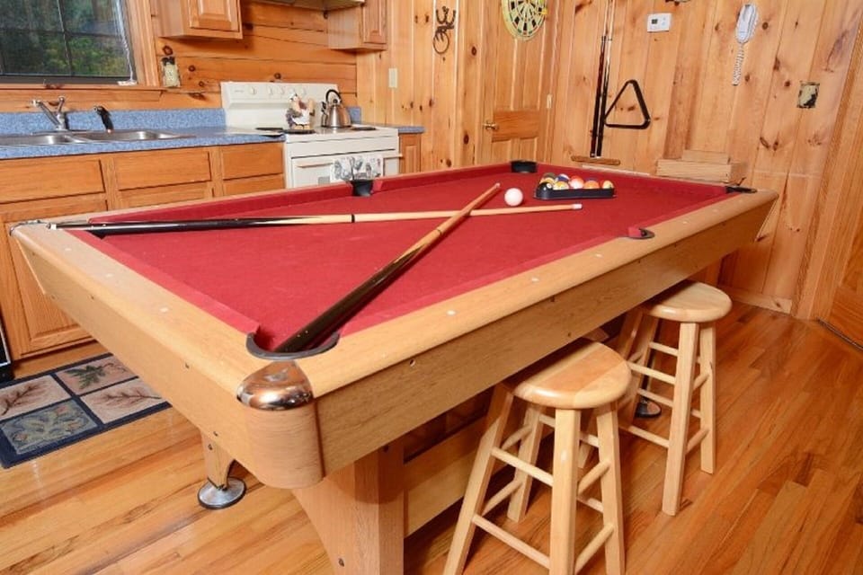 Kitchen table converts to pool table.