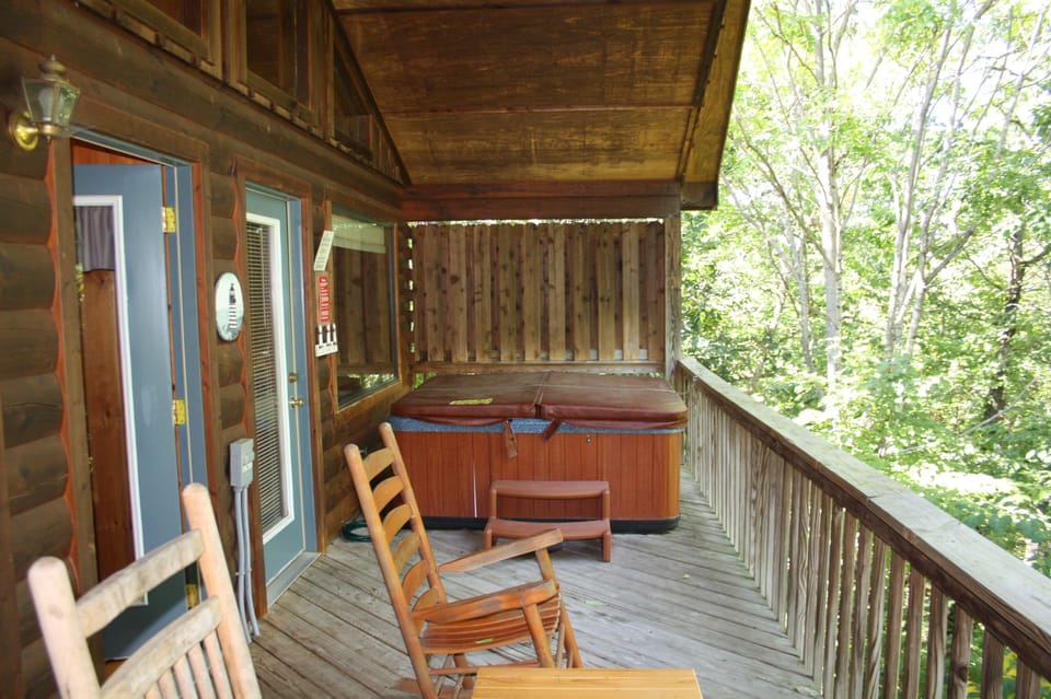 Spacious Porch with views of foliage. 