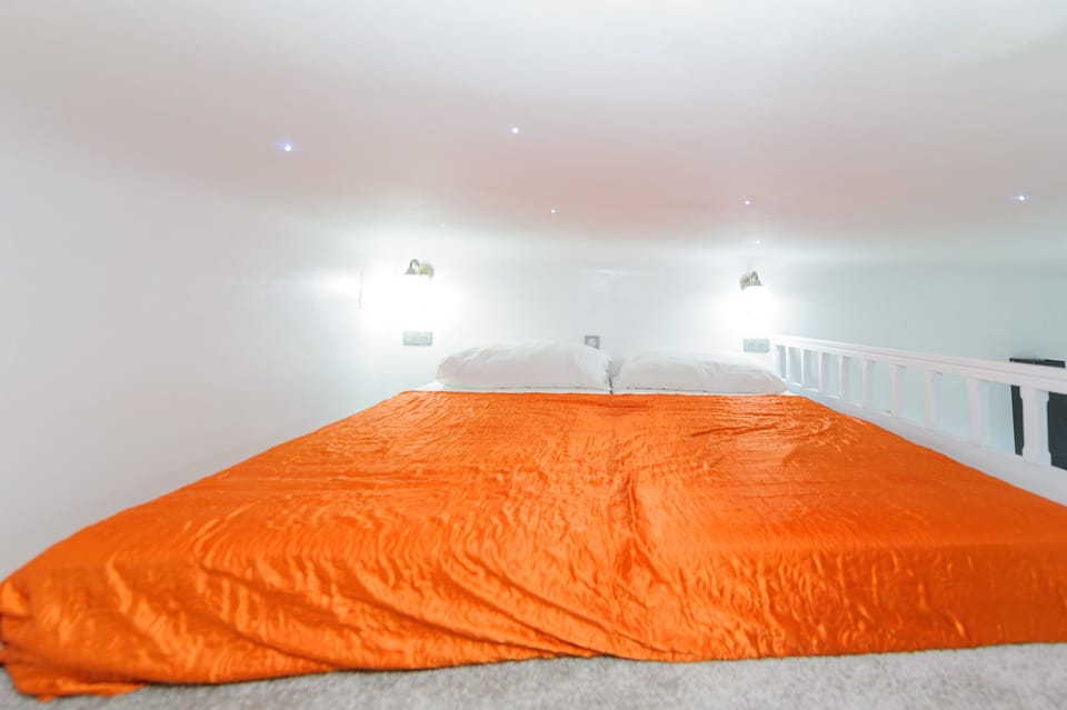 Deluxe Apartment, Kitchen | 1 bedroom, desk, blackout drapes, iron/ironing board