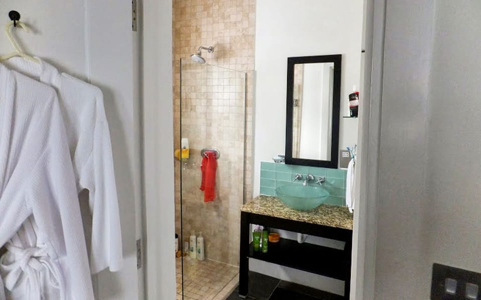 Master Bedroom Ensuite Bathroom with Glass Enclosed Shower, Sink and Toilet