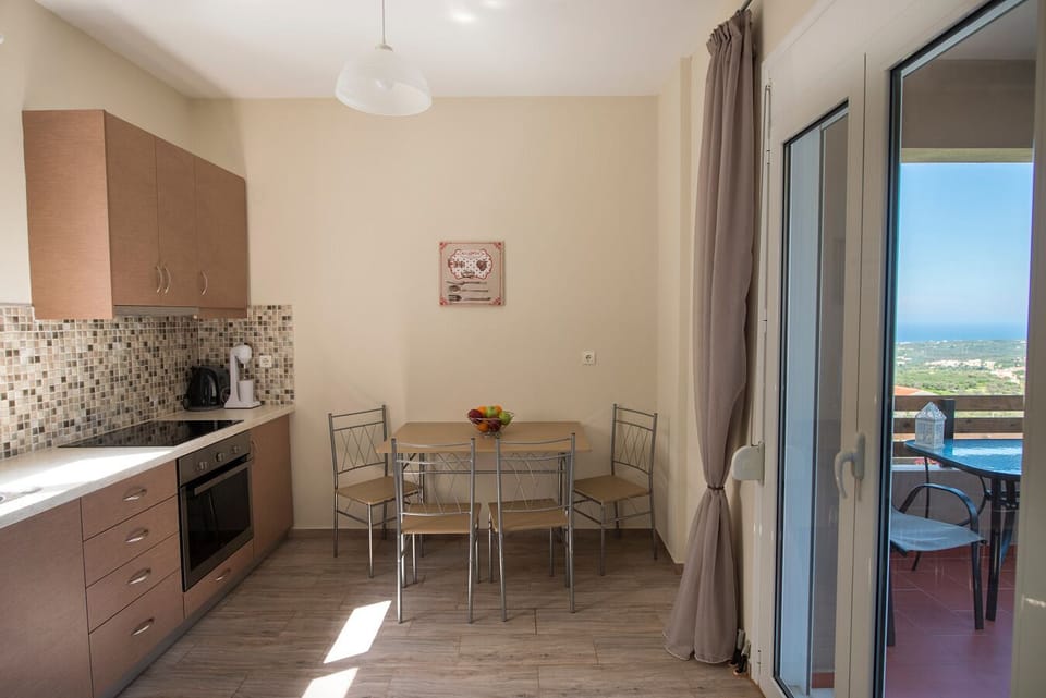 Fully equipped kitchen with direct access to outdoor dining area