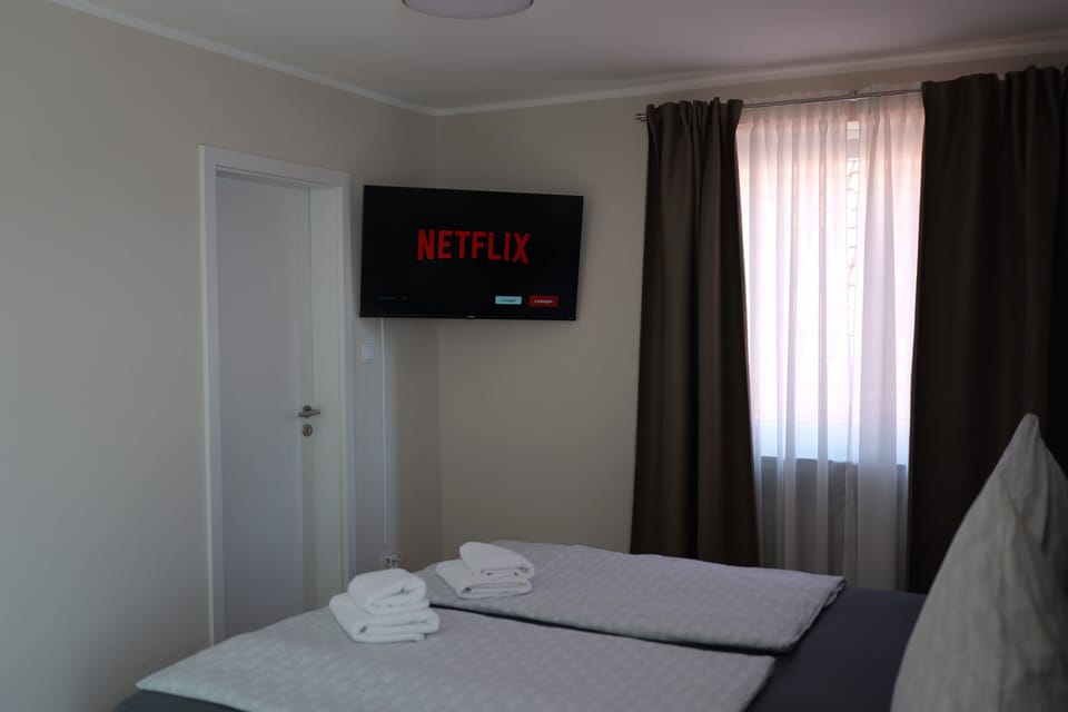 Double Room | Desk, laptop workspace, blackout drapes, travel crib