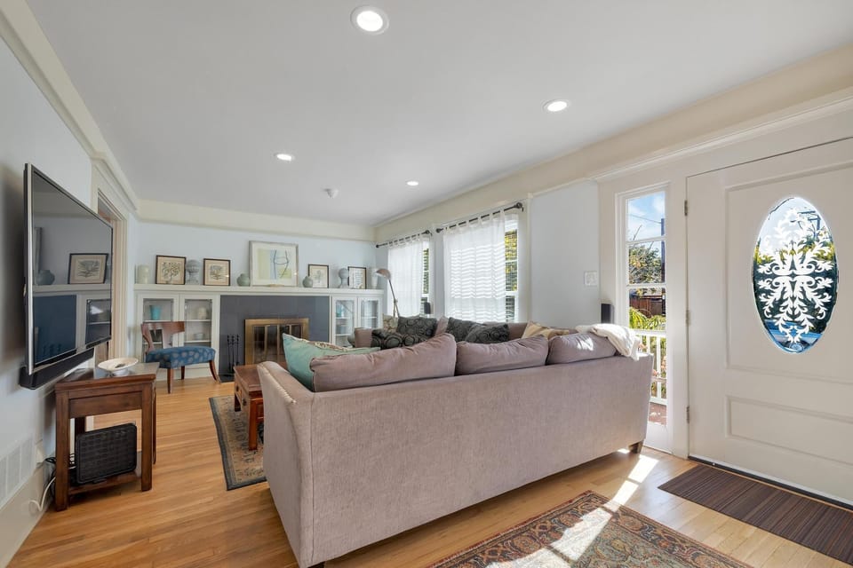 Living room is complimented with a lot of natural light.