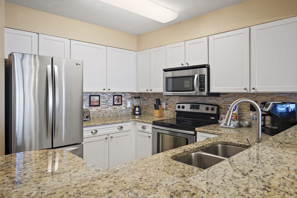 Full kitchen with stainless appliances