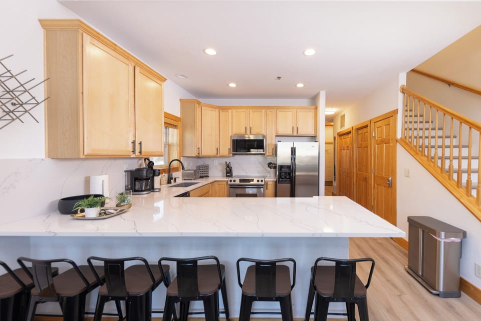 6 seats for dining - easily wrap around corner for additional elbow room. 