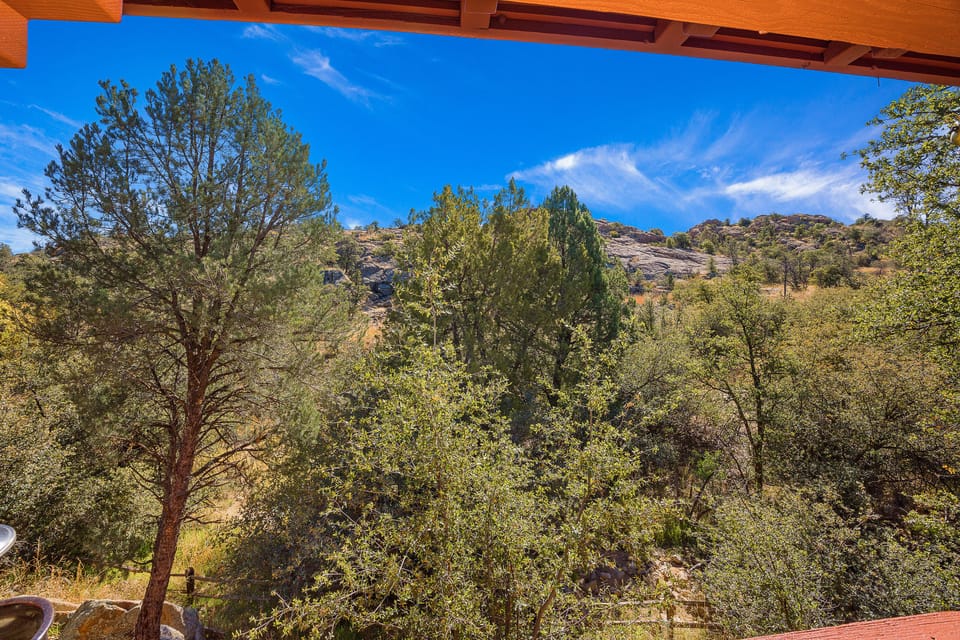 Watson Lake can be seen from top of hill.