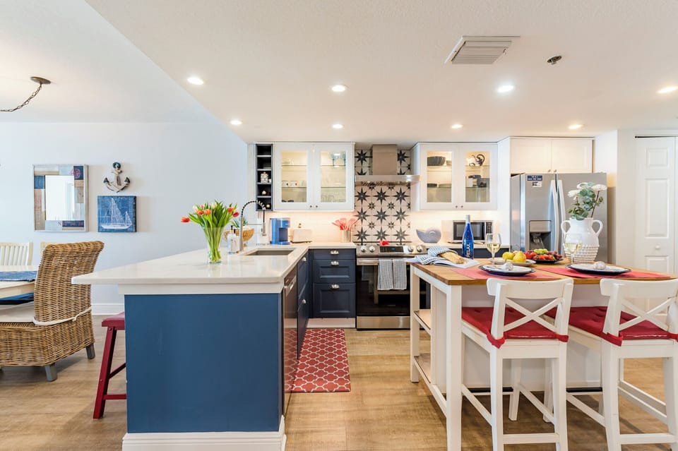 New remodeled kitchen with large island, cabinet lights and pull out drawers. 