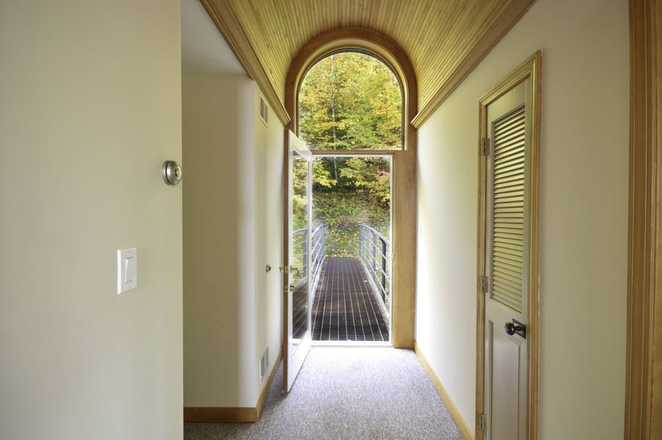 Back door bridge. On left is door to Doe room, linen closet on right.