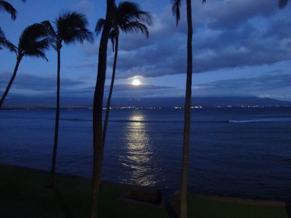 Rejoice in the captivating views like the full moon rising over Haleakala 