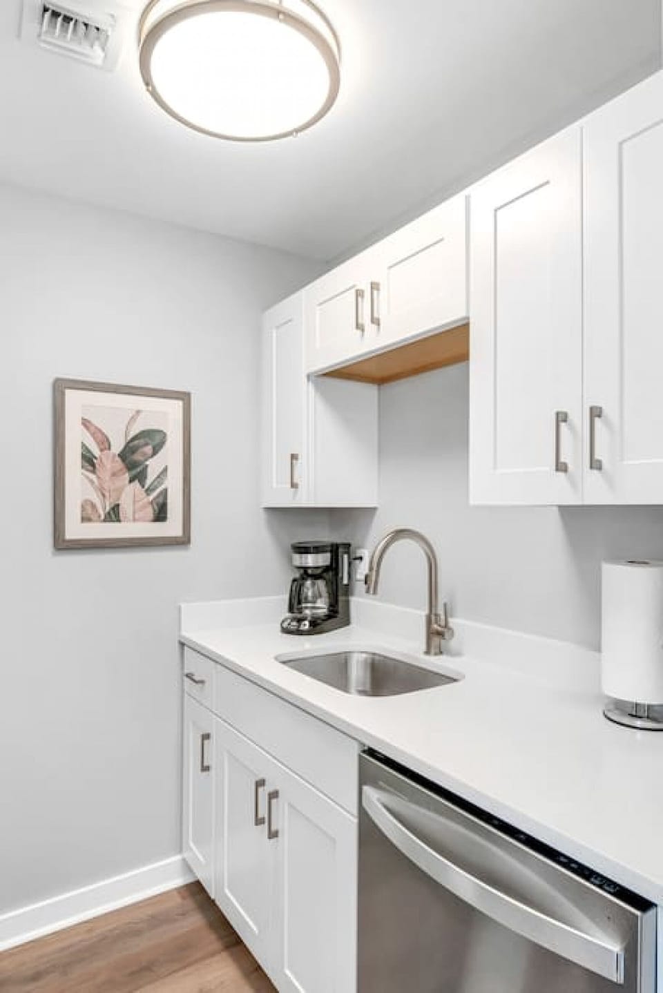 Fully stocked kitchen with coffee maker