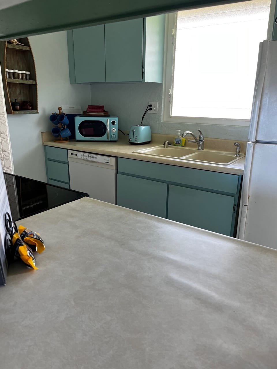 Fully stocked kitchen with everything you might need for cooking to dine at home