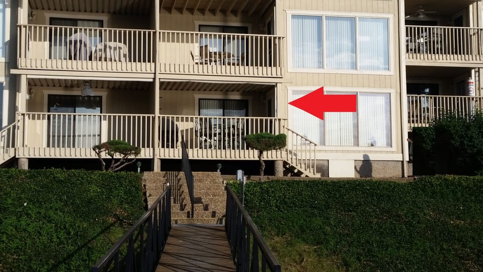 Walk-out patio right in front of boat dock.   Only 4 walk-outs in the complex!