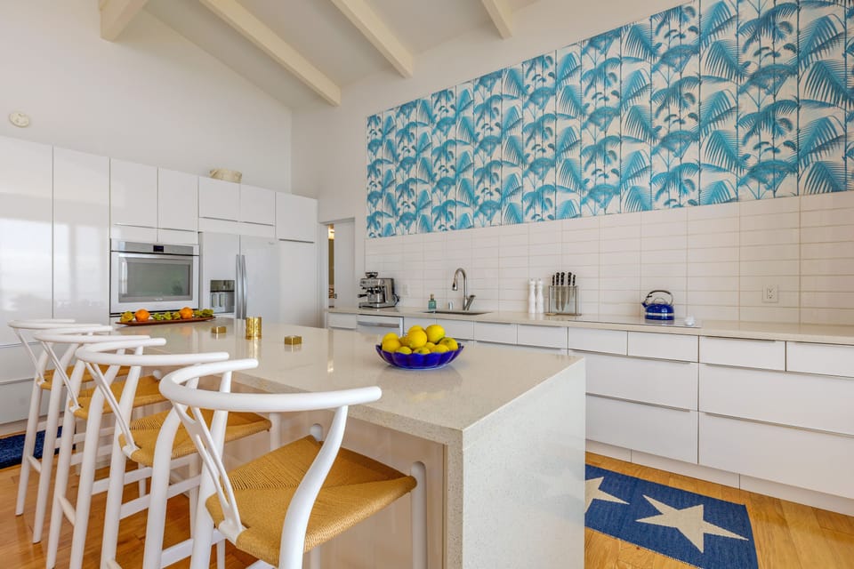 Fully equipped luxury kitchen with cooktop & oven. Great espresso machine. 