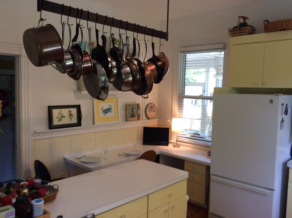 Eat in kitchen with plenty of quality pots and pans.