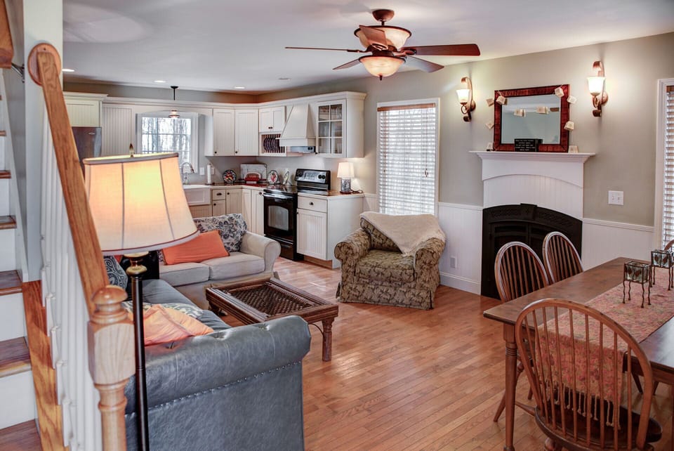 Open floor plan: living room, dining and kitchen
TV above fireplace now