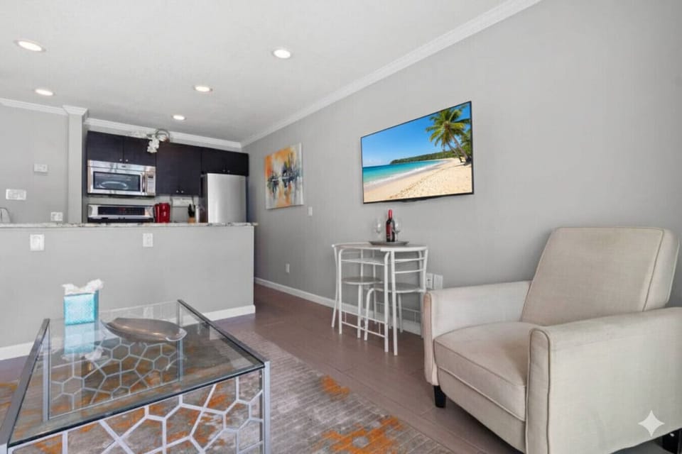 Living Room: Bright space with modern decor, perfect for unwinding after a day of adventure!