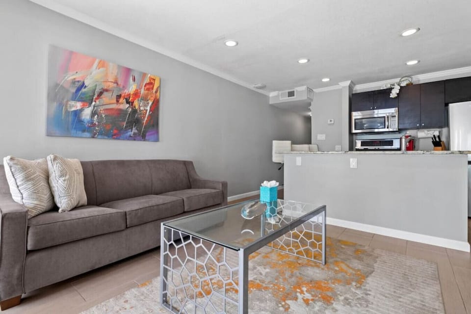 Living Room: Enjoy vibrant decor and modern comforts in this stylish gathering space!