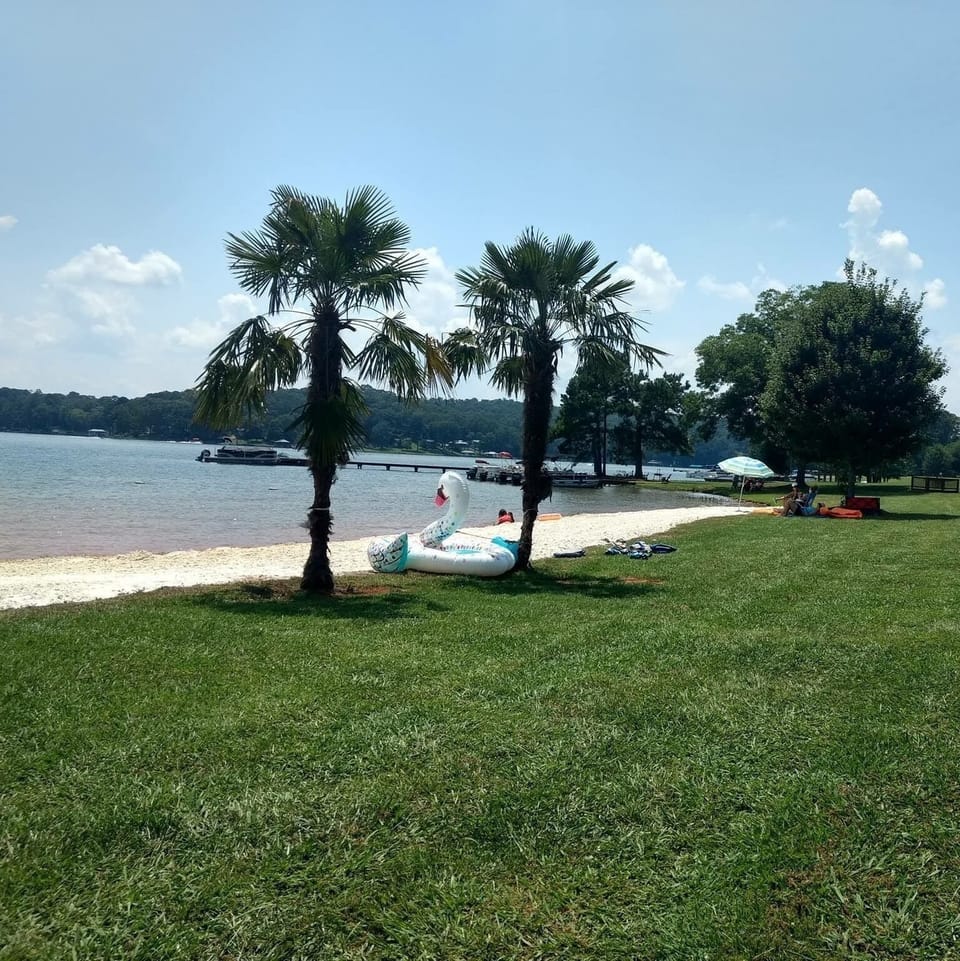 Sandy white beach within RV Resort.