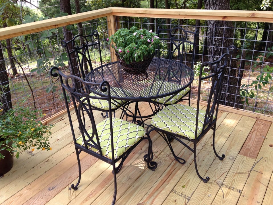 Deck table & chairs sit 4. Christmas lights can be plugged in all year long. 