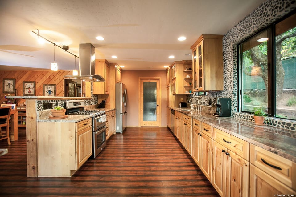 a well stocked and beautiful kitchen 