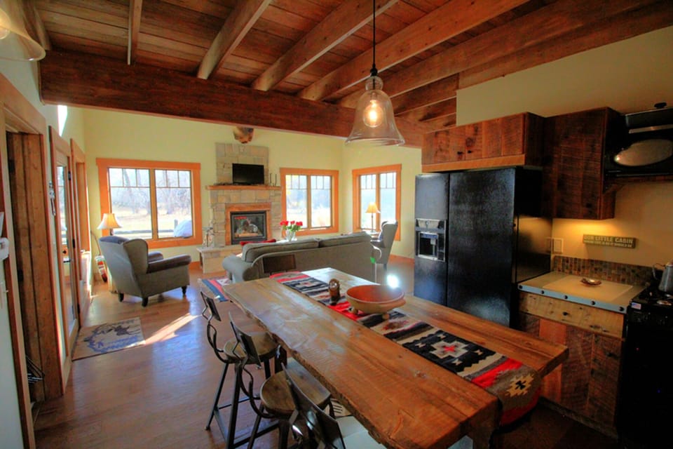 The dining room. kitchen and living room of the Liar's Lodge.