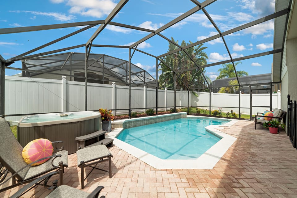 Enjoy an evening in the hot tub, as kids splash in the pool!