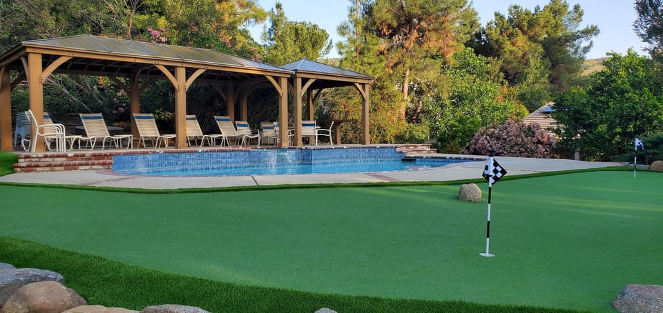 Enjoy a round with your private putting green adjacent to the pool and Gazebos